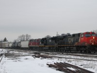 CN 2565, IC 1036 and CN 104 lead 115 cars on an X33231 15 from Sarnia, ON en route to Mac Yard
