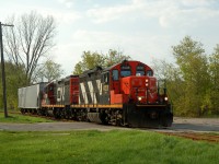 A lot has changed in the 32 years since Bruce snapped his photo ( http://www.railpictures.ca/?attachment_id=22779 )Here in 2008, 587 runs across Eagle Ave with a pair of GP9RM's and a single hopper for delivery to Ingenia