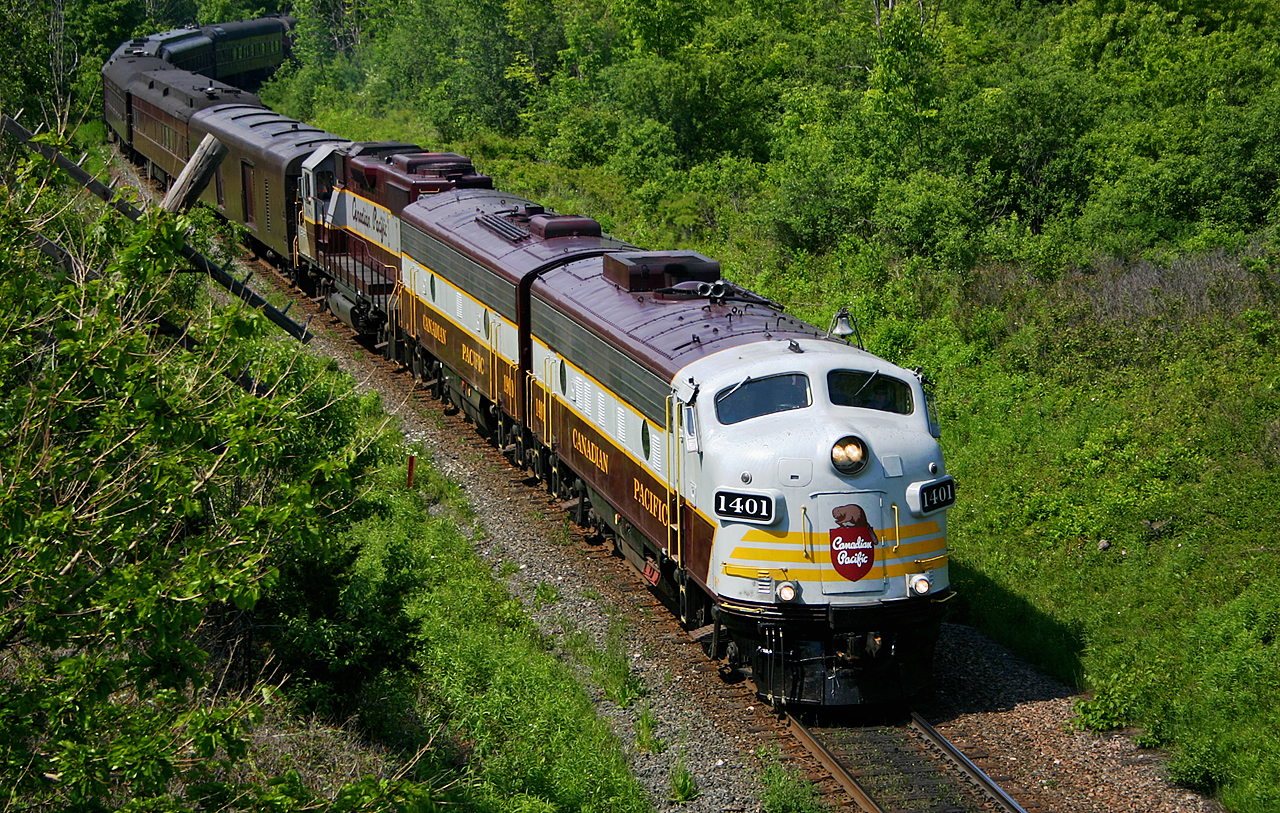 One weekend prior to the arrival of The Empress, aka CP 2816 fans were treated to the CP F Units which operated several rail miles trips with the Royal Canadian Pacific.  On June 5th, the F units travelled east down the Galt Sub to Guelph Junction where they made a trip down to the old TH&B Hunter Street Station, before wyeing at Aberdeen Yard.  They went back north of the Hamilton Sub and onto the old Goderich Sub up to Guelph for the night.  Here we see the train snaking under the Highway 6 overpass on the way down to Hamilton.