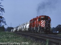 Back when the SD40-2 was king on CPR a trio of them lead by 5686 powers Second 507 out of the Hornby Dip with an acid train heading west on the Galt Sub. 
