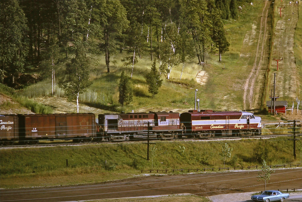 A little nostalgia here as CP 4085 leads a westbound freight at Glen Eden ski resort in the Kelso Conservation Park near Milton, ON in 1967.  This train is climbing toward Campbellville and then on to Guelph Jct. where it will hoop train orders before proceeding westward to Galt.