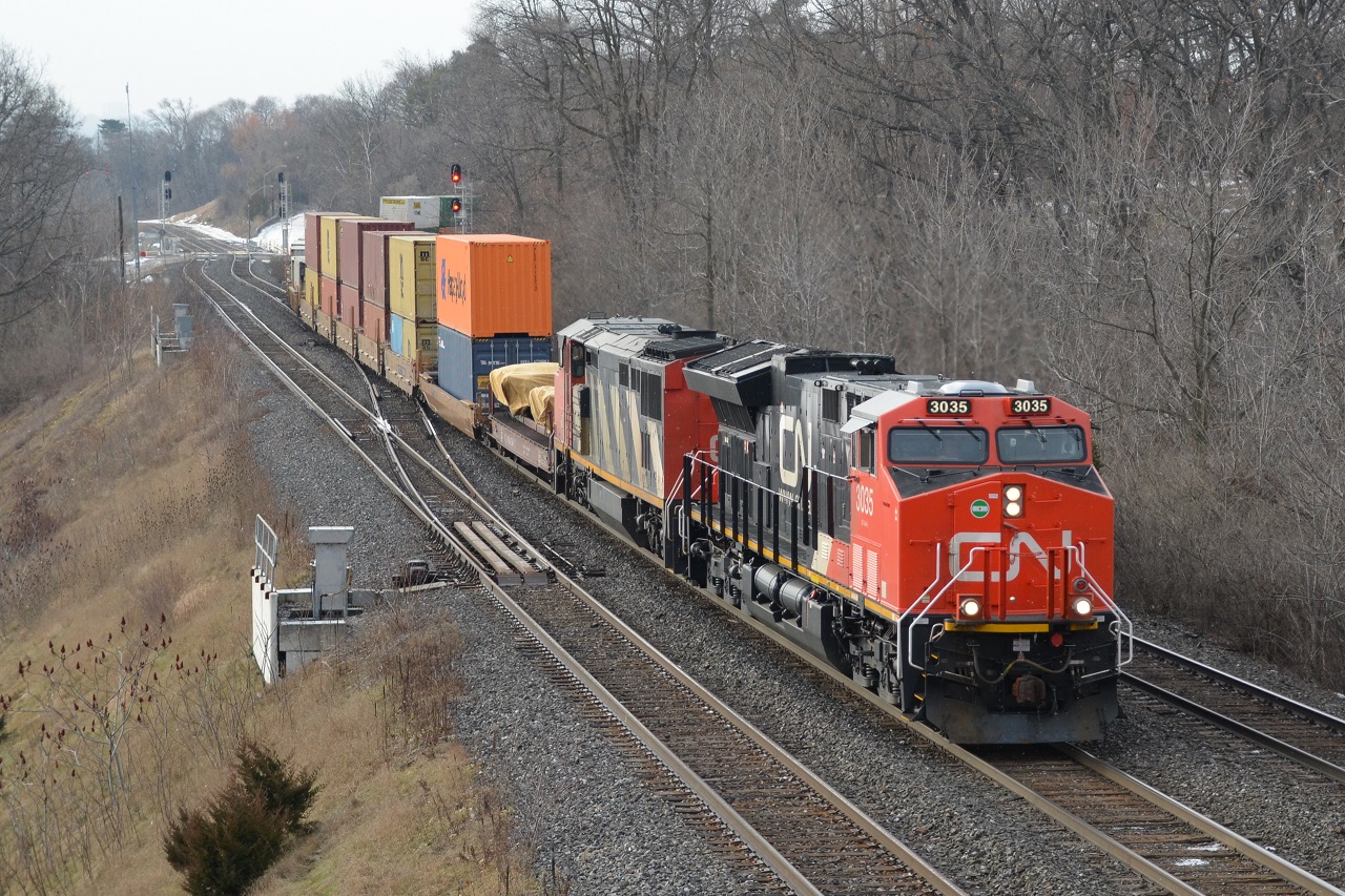 Since Joseph responded to my CN E231, I thought why not do the same! Here is CN Q148 passing through Bayview Jct. during a break in the snow.