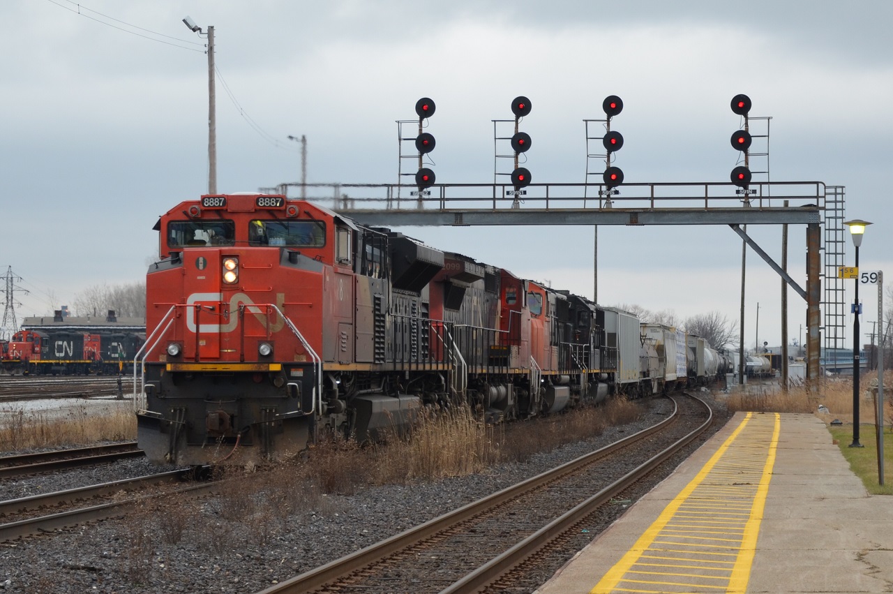 CN M382 exits the international tunnel from Port Huron and and gives a horn salute to the many spectators at the station. I believe this was 382. If someone could confirm that would be appreciated.