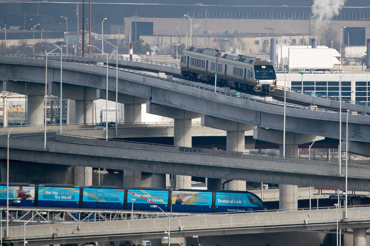 Over/ Under at YYZ. To date, I have yet to see a 3 car train. Perhaps a pricing adjustment might be the motivation to change what looks a lot like a white elephant.