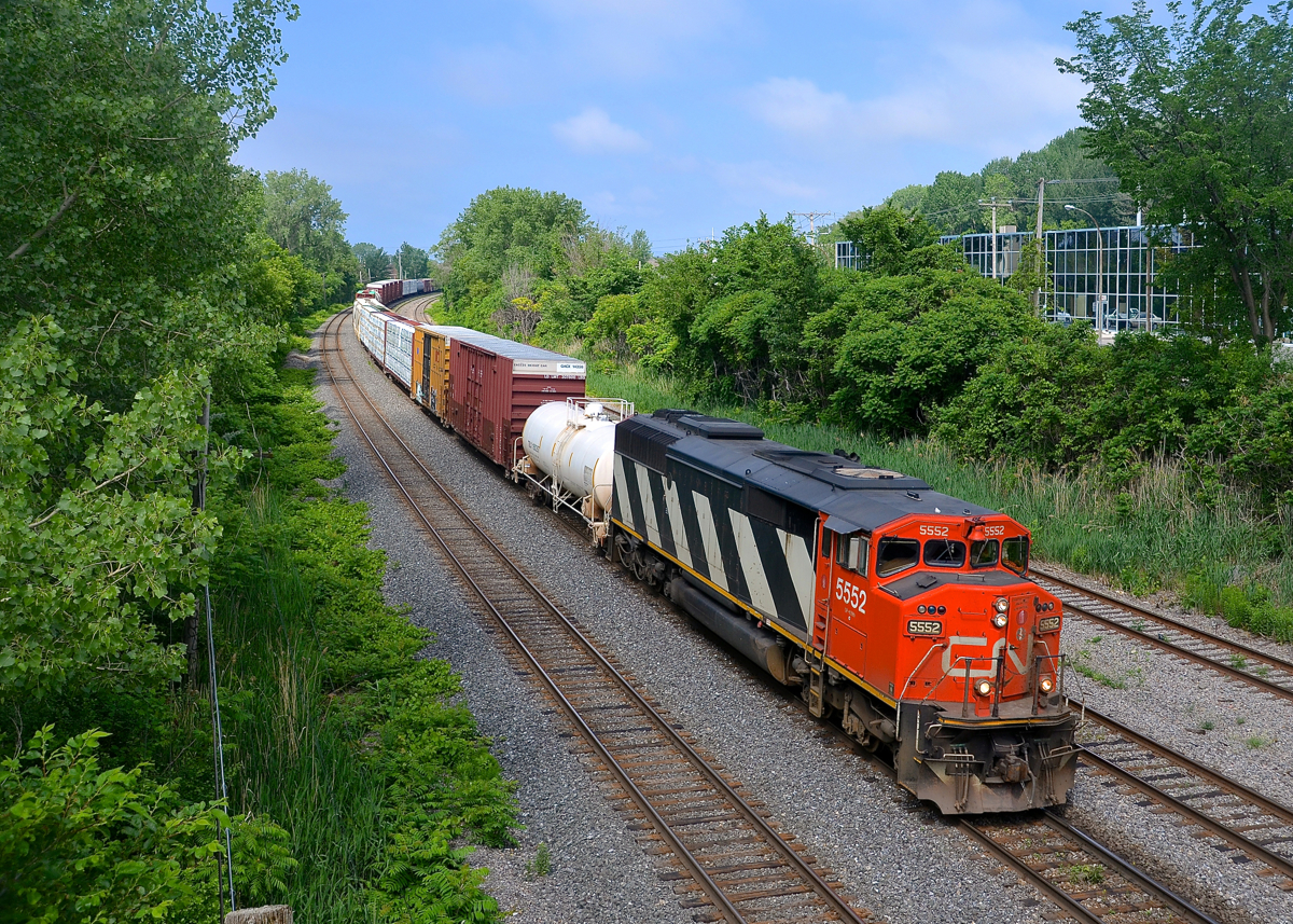A solo SD60F. SD60F CN 5552 is the sole power on CN 324, bound for St. Albans, Vermont.