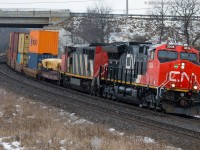 CN 148 leans into the curve at Garden Ave with CN 3035 and CN 2417 providing the power this morning. I was on my way to the Paris Train show and a timely heads up from Kyle and Cody while I was getting gas on Highway 2 gave me the time to get in position at Garden.