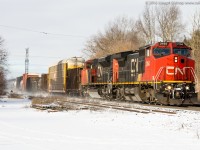 CN 384 cruises through Copetown with CN 2164 and CN 8814 on a bitter yet sunny January morning.  They had a crew change at Brantford before continuing East.
