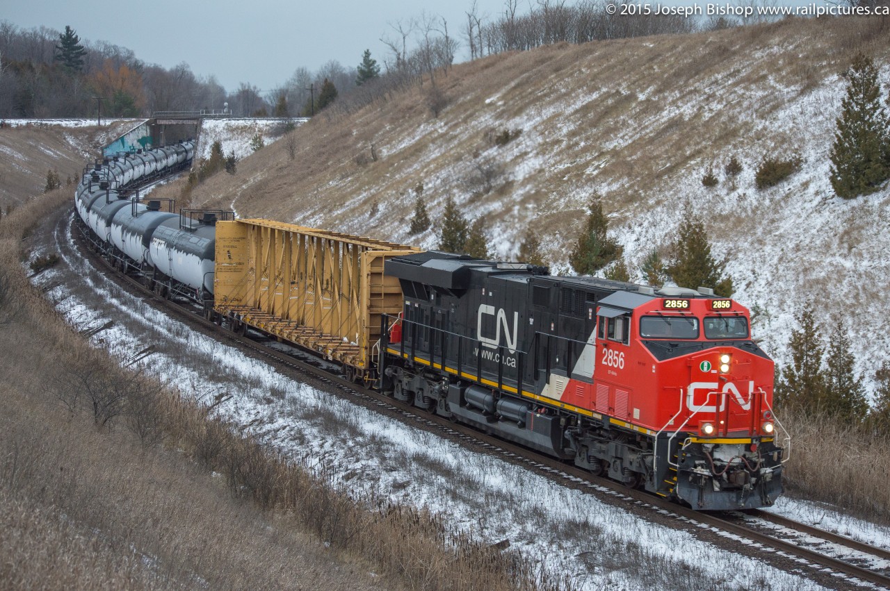 CN 305 grinds upgrade at Beare with CN 2856 leading the charge and CN 2883 mid train.