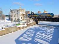 <b>Double P42DC's past Wellington Tower.</b> VIA 24 has two P42DC's for power (VIA 913 & VIA 909) as it passes Wellington Tower with a Renaissance consist on a sunny but very cold day.