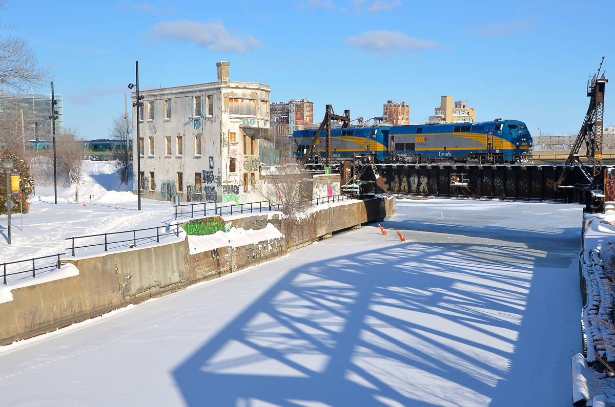 Double P42DC's past Wellington Tower. VIA 24 has two P42DC's for power (VIA 913 & VIA 909) as it passes Wellington Tower with a Renaissance consist on a sunny but very cold day.