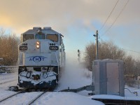 <b>Crossing over in the snow.</b> AMT 86 is crossing over to the west track at Lasalle station, very unusual as normally all AMT trains operate on the east track.