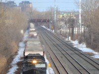 <b>High headlight on the transfer track.</b> CN 529 is almost done its run as it approaches Taschereau Yard with NS Dash9 and Dash8 widecabs (NS 9003 & NS 8420, the latter ex-Conrail). 