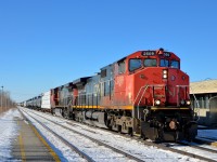 <b>A pair of Dash9-44CWL's.</b> A pair of Dash9-44CWL's (CN 2509 & CN 2501) with their distinctive 4-piece windshields lead a rare non-DPUed CN 368 through Dorval.