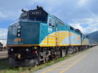 VIA RAIL ON A SUMMERS EVENING TAKING ON FUEL, PASSENGERS AND SUPPLIES FOR THE JOURNEY EAST.