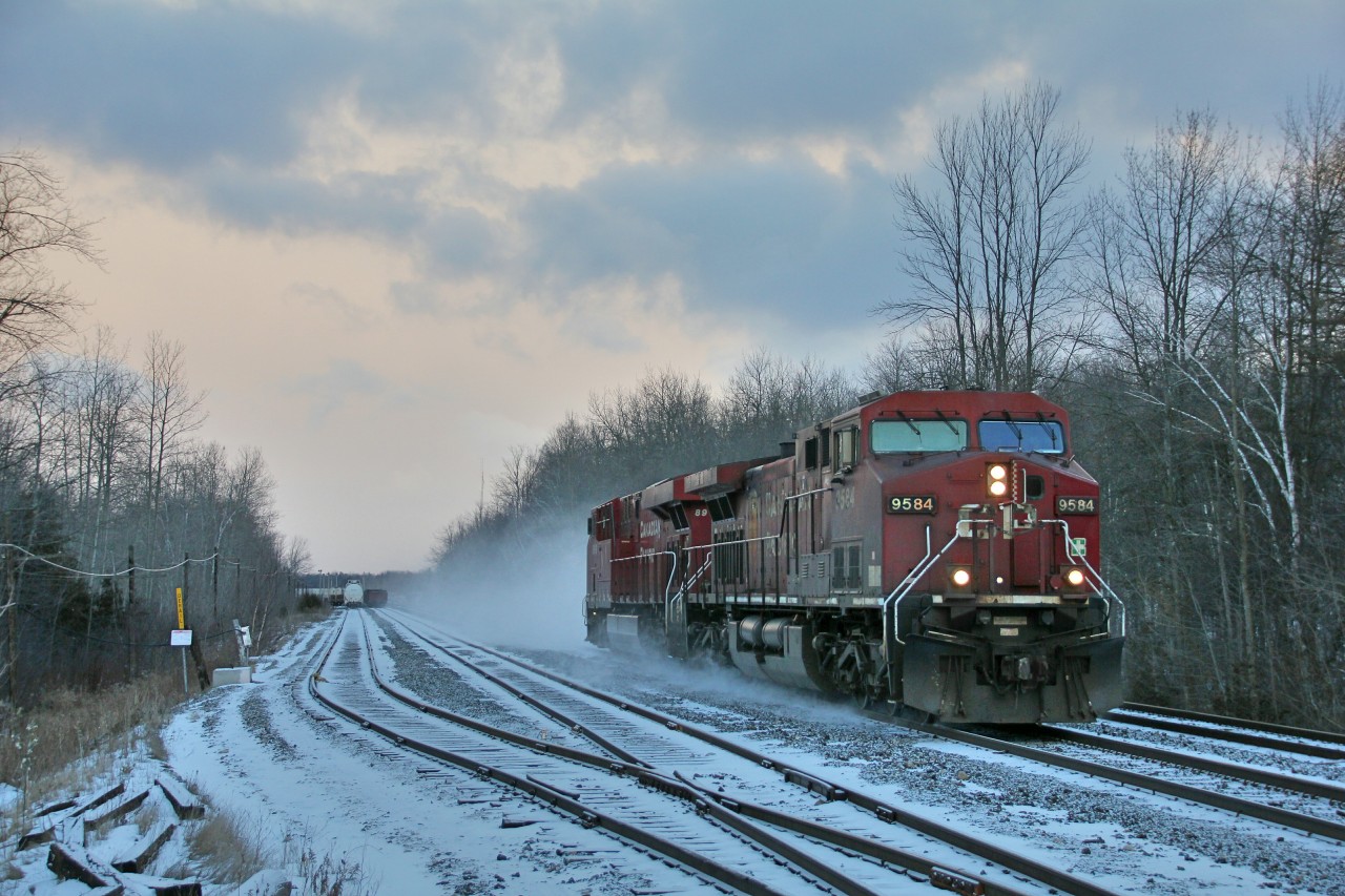 CP 147 files through Guelph Junction in the last moments of daylight. Light power is the only thing to see today, and some snow being kicked up into the arctic feeling air.