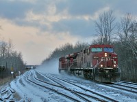 CP 147 files through Guelph Junction in the last moments of daylight. Light power is the only thing to see today, and some snow being kicked up into the arctic feeling air.