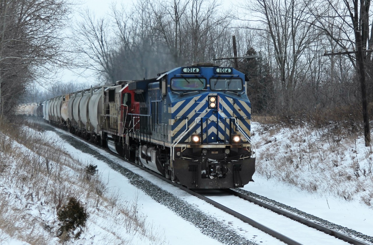 CEFX 1014 leads a still red and white SOO 6037 around the bend and down the grade up to MM43 on the Galt sub.