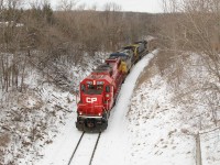 EX-SOO and now CP 6238 leads CSX 512 and CSX 56 down the Hamilton Sub. and are about to go under the Snake road overpass.