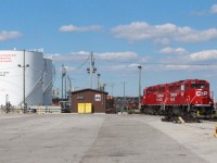 Local switching pair of GP20C-ECO's led by 2261 wait for the crew at the diesel fuel storage tanks.