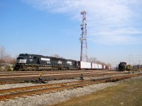 <b>NS on CP.</b> SD60M NS 6765 & SD60 NS 6684 are stopped at CP's Lasalle Yard with CP 930 in April 2008, presumably because CP's bridge over the St-Lawrence Seaway is up. At this point in time, CP 930 used CP tracks from Montreal on its trip to upstate New York. Since 2013, this train originates on CN tracks in Montreal as CN 528 and is  interchanged to CP at Rouses Point where it becomes CP 930.