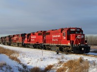 Former SOO GP38-2 4403 along with GP38-2 3075, ES44AC 8917 and AC4400CW 9750 make a light engine move to Kinder Morgan's Rail Terminal in east Edmonton.