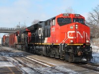 Two of CN's newer locos 3028 and 2938 power up the bank. The early snow had gone and the sun had arrived but it was still very cold!