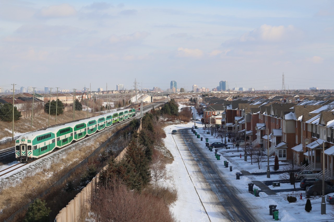 GO cab car 250 is about to roll into Mount Pleasant station in Brampton's west end. It's hard to imagine this location just over a decade ago was all farmland. Now Brampton's urban sprawl fills the scene.