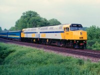I am still having trouble coming to grips with the fact these F40s are now over 25 years old. To me, they are still the "new junk" that came along to knock off our beloved F units; so popular that hoards of American fans came to pay us a visit in order to spend a day shooting them before they were gone. Here, late train #75 spots two new units at the beginning of their life; VIA 6443 and 6445; plenty of power for this train. This replaced the A-B-B-A setups we were so in love with back then.  When this train came by; I wondered why they were not consecutive numbers........well, the next westbound, #77, had the 6444 as power.  The 6444 was wrecked in that horrible accident in Burlington in 2012, but these two units pictured soldier on.