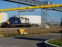 I was hoping to shoot this job coming out with some cars.. but a broken rail changed all plans and the crew are returning to the yard light power, not taking the risk of running cars across a broken rail. Shown is the train leaving the Bunge yard area in the North end of Hamilton along Burlington St.



