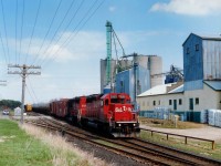 From a vantage point on the property of now the former Schneider's Meat plant in Ayr, this image location has undergone a major change since I shot this . Not so much that STLH has now been absorbed back into CP after being a spin-off in 1996, but the fact the huge grain silo building in the background, the former Niagara Grain & Feed; was demolished in late 2015. Nothing there now. Interesting trackside props are disappearing, one by one. For the record, behind STLH (now CP) 5560 is CP 6000.
