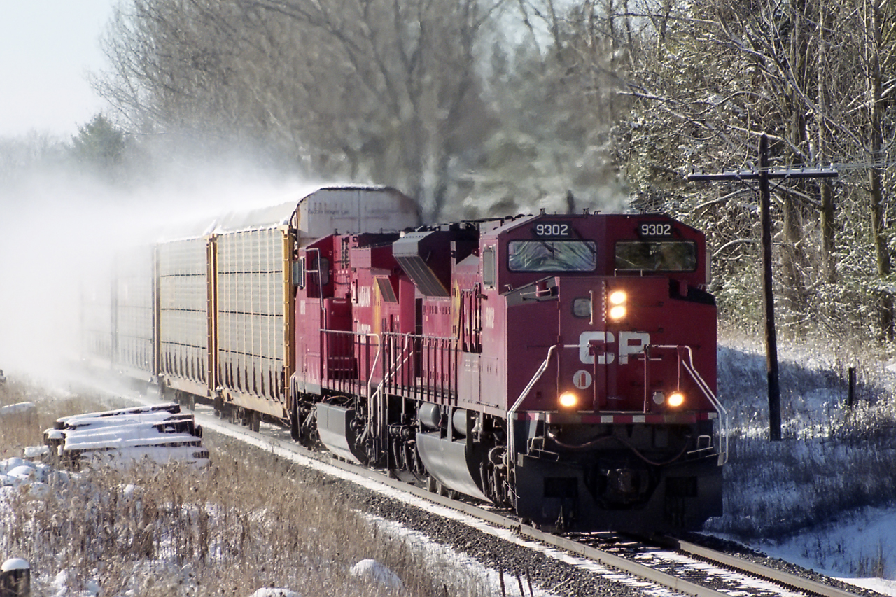 One of only 2 times I caught a 9300 leaving and I picked the wrong spot. After a long wait, fresh snow explodes off the racks as 138 gets back up to speed leaving Galt.
