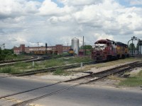 An overall view of Chessie,s engine facilities in St Thomas before every thing was demolished. The yard office is directly behind me and the actual yard ( Buffalo yard ) to the west across the hi level bridge. Named Buffalo yard because there was a farm with buffalo next to the yard. Three homely looking units in one spot. GP38,s soon replaced these wore out engines. 