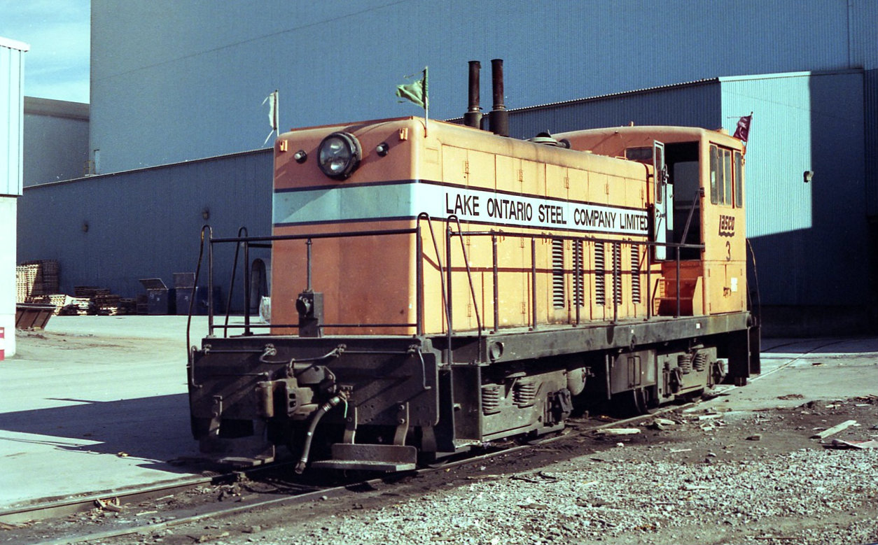 GE 70 ton , Lasco #3. Built 6-1948   , ex NS 103. Seen here in the plant at Whitby, reason for the flags unknown.