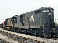 N&W 2705 GP18 and 8067 C30-7, lay over on the CN at St Thomas. 