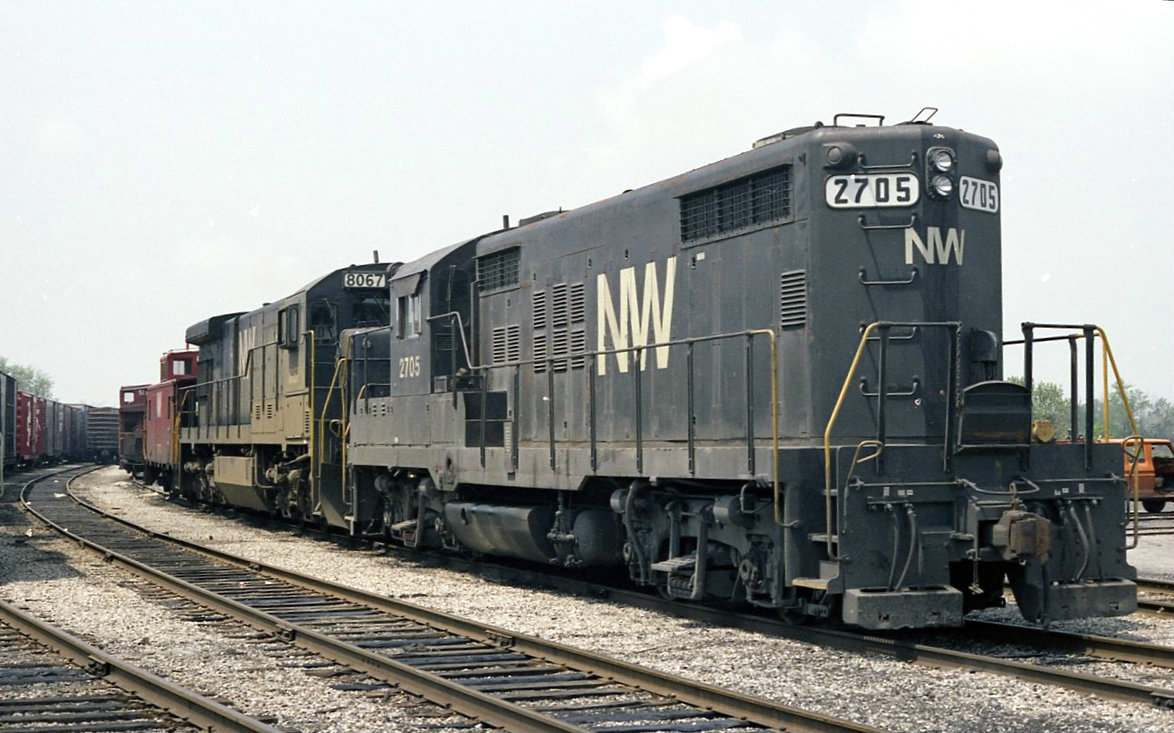 N&W 2705 GP18 and 8067 C30-7, lay over on the CN at St Thomas.