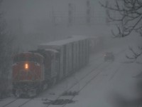 How would you like to be out in these elements? A raging late day lake effect blast was affecting the west end of Lake Ontario on this Feb 1 2008 day. 435 is working Aldershot while the maintainer stops and checks the switches. Brrrrrr. - See more at: http://www.railpictures.ca/?attachment_id=22611#sthash.emlrpbvq.dpuf