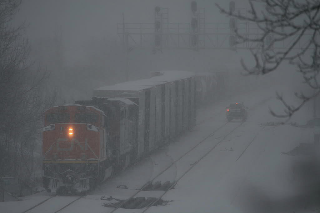 How would you like to be out in these elements? A raging late day lake effect blast was affecting the west end of Lake Ontario on this Feb 1 2008 day. 435 is working Aldershot while the maintainer stops and checks the switches. Brrrrrr. - See more at: http://www.railpictures.ca/?attachment_id=22611#sthash.emlrpbvq.dpuf