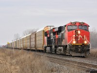 CN 2842 and 3038 with train Extra 332 approaches Telfer Road east of Sarnia. 