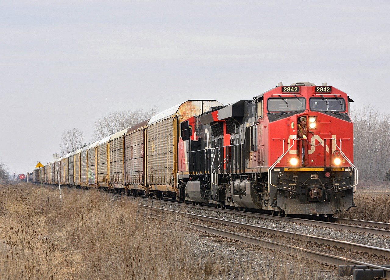 CN 2842 and 3038 with train Extra 332 approaches Telfer Road east of Sarnia.