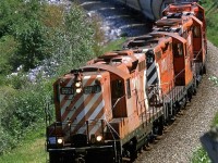 As expected, the "Exshaw Turn" had the same power as it had been using the last few days. I figured that I needed this shot on the S curve east of Brickburn. Once again, it looks like there are lots of grain cars to set out at Kieth yard.