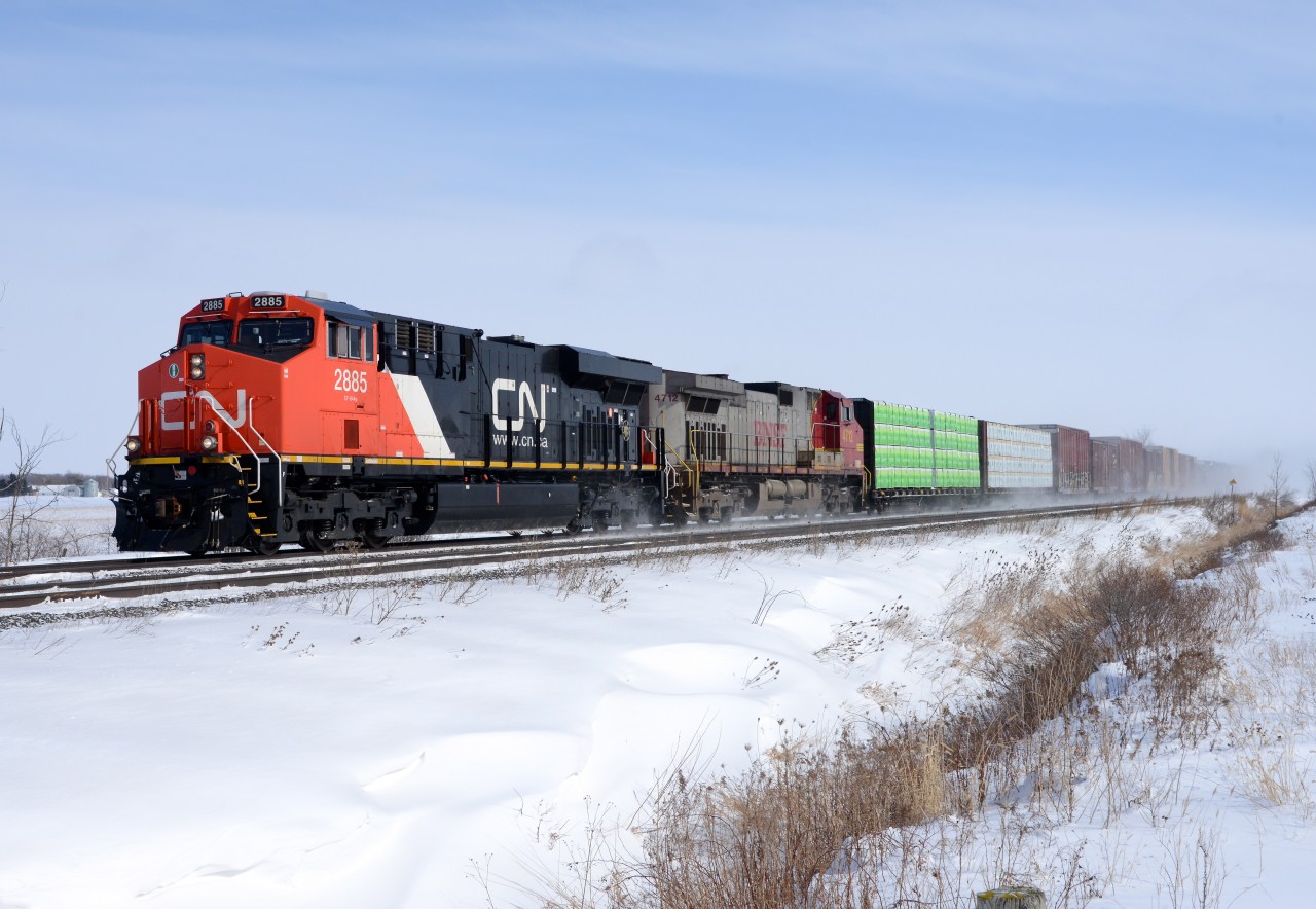 CN 2885 with BNSF 4712 west bound at Waterworks Sideroad on a sunny but very cold February day almost one year ago.