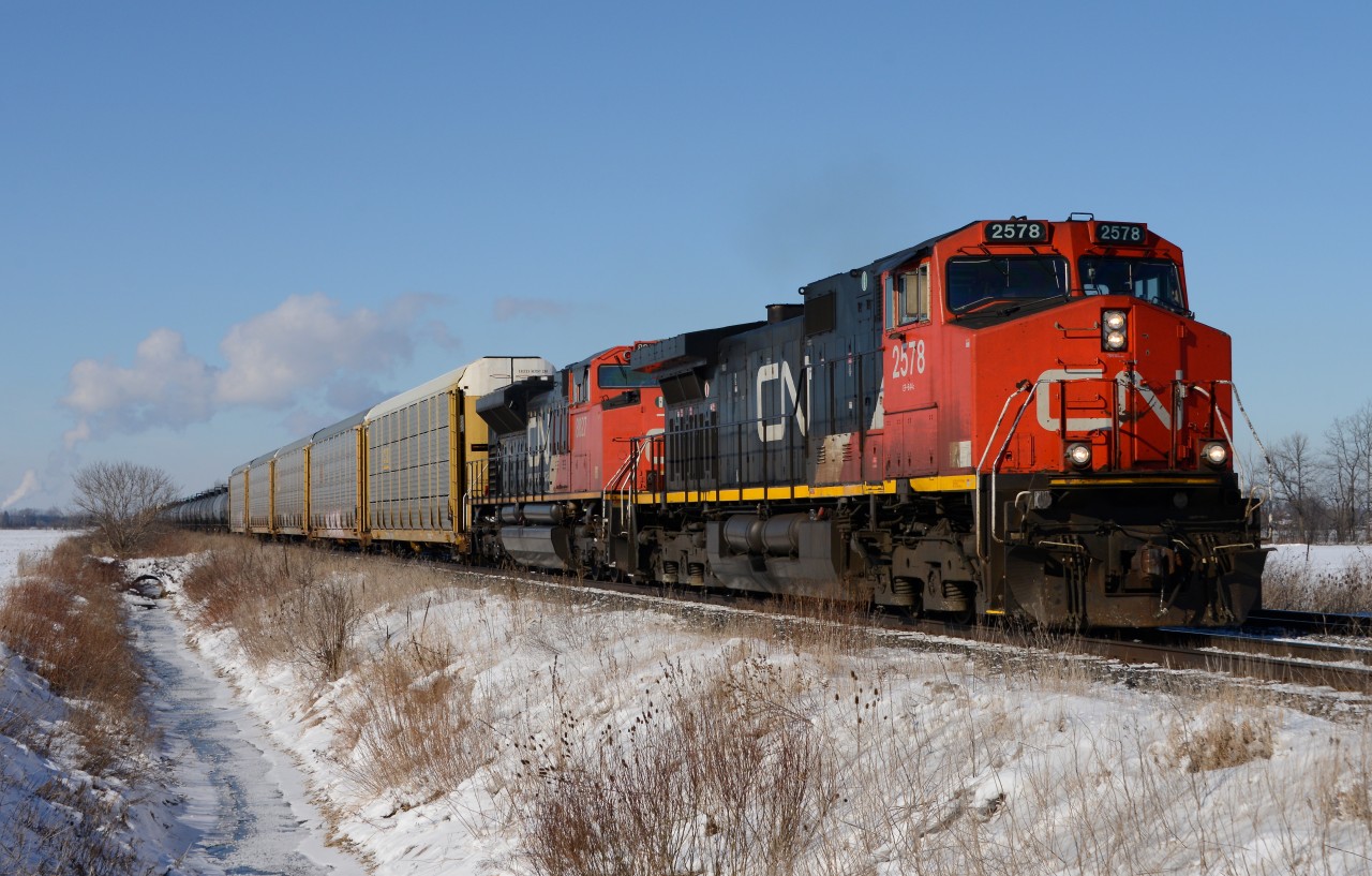 Train 332 east bound out of Sarnia at Waterworks Sideroad on an extremely cold Sunday morning with CN 2578 and 8827.
