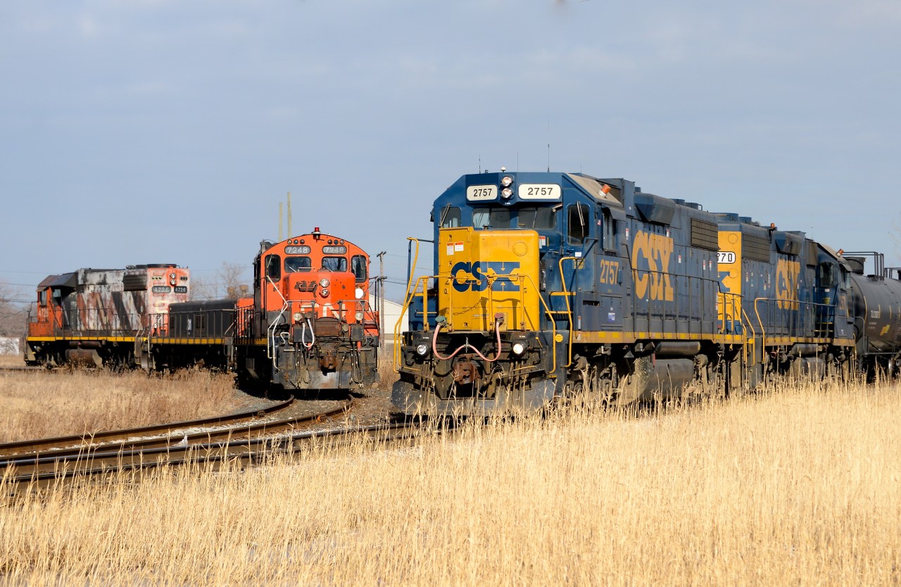 The CSX daily returns with her cut while the IOX waits for her to clear and then shift cars at Imperial Oil LPG.