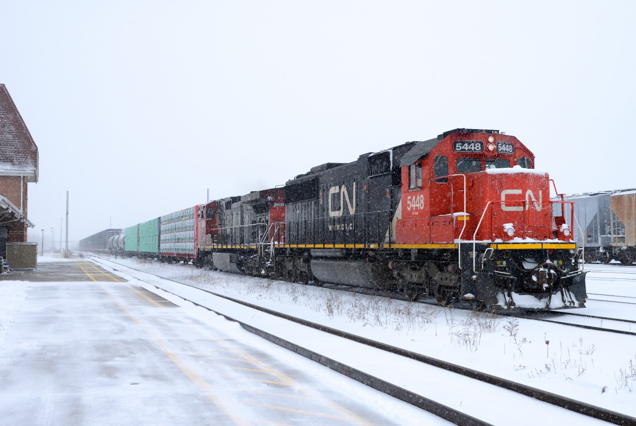Train 501 heads west out of Sarnia towards Port Huron, Mi., with CN 5448 and CN 2508.