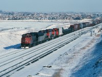 <br>
<br>
On a very cold January Saturday my trusty '79 Pontiac wagon  ( The  Parisienne – Atlantica ) found its way to CN Snider, where to no surprise a westbound typical  mixed freight with mixed power – some what unusual given GMD only – is occupying  the turnout to enter the Mac Yard lead.
<br>
<br>
CN 9554  ( GMD 1975 built GP40-2L(W) ) is teamed with a venerable F7Bu ( GMD 1951; rebuilt 1972 to 'u' status) and two other GP40's. The trailing SW may have been lifted at Oshawa along with the coiled steel gondolas – perhaps from Lasco Steel ( now Gerdau ).
<br>
<br>
All thirty of  the  CN rebuilt  (1972 ) F7's will be retired by 1989.
<br>
<br>
What's interesting: 1985: 
<br>
<br>
The year of the Polar Vortex ( yes, that term is not new ! )
<br>
<br>
The final chapter of the CAR begins:
<br>
<br>
 April 30 - CN and CP take over the Canada Southern (Michigan Central/New York Central/Penn Central/Conrail) line(s) through southern Ontario. 
<br>
<br>
more York Subdivision:
<br>
<br>
<a href="http://www.railpictures.ca/?attachment_id=16998"> MLW#2035 </a> 
<br>
<br>
<a href="http://www.railpictures.ca/?attachment_id=12709"> BBD#2118 </a> 
<br>
<br>
<a href="http://www.railpictures.ca/?attachment_id=2007"> BBD#2111 </a> 
<br>
<br>
and surprise, new owner:
<br>
<br>
<a href="http://www.railpictures.ca/?attachment_id=16820">  the repainted 9554 today </a> 
<br>
<br>
sdfourty