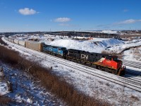 2236, IC 2459 and 2653(DPU) haul the daily Toronto-Moncton manifest past the growing construction GO Transit's new maintenance facility. It won't be long before this location is history; South Blair St. is nearly completed and construction has started on the east side of Hopkins St.