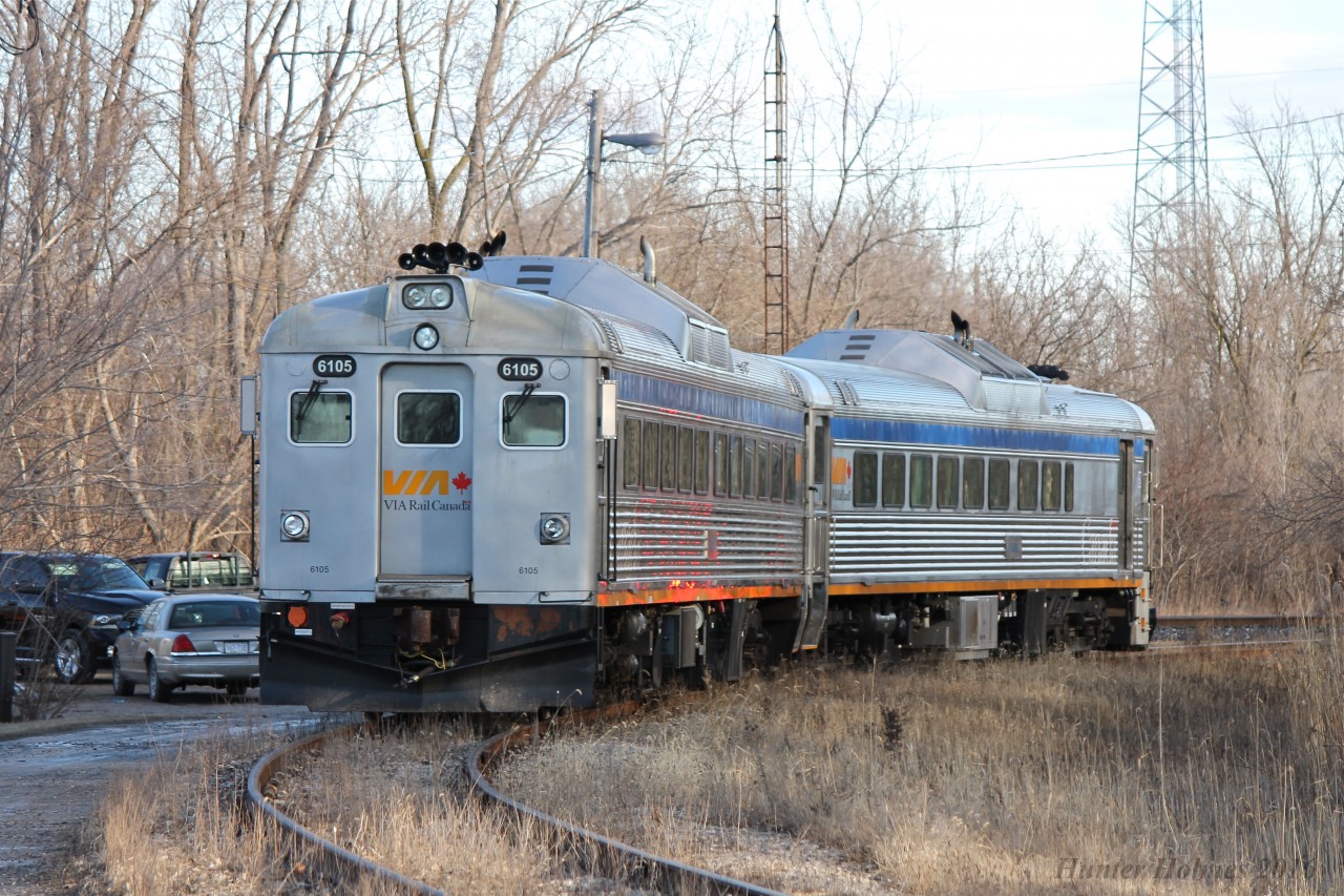 Two VIA RDC's sit parked on the South leg of the wye from the Chatham Sub at Chatham East, to the Sarnia Spur at Chatham South. The units are in the area conducting tests on crossing response to RDC's at speed on the Chatham Subdivision. Accompanying the RDC units was VIA F40PH-2d 6442 which towed them down to Chatham in the early hours of Saturday morning. Due to difficulty turning 6442 the plan of having it head the consist home was scrapped and it instead was left in the yard until testing was complete and it pushed the RDC's back to London.