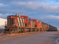 CN 1437 and sister 1439 sit stored with various amounts of mainline power from SD60's to SD70/75i's. CN 1412 and CN 1444  sit out of view also stored as well. 
