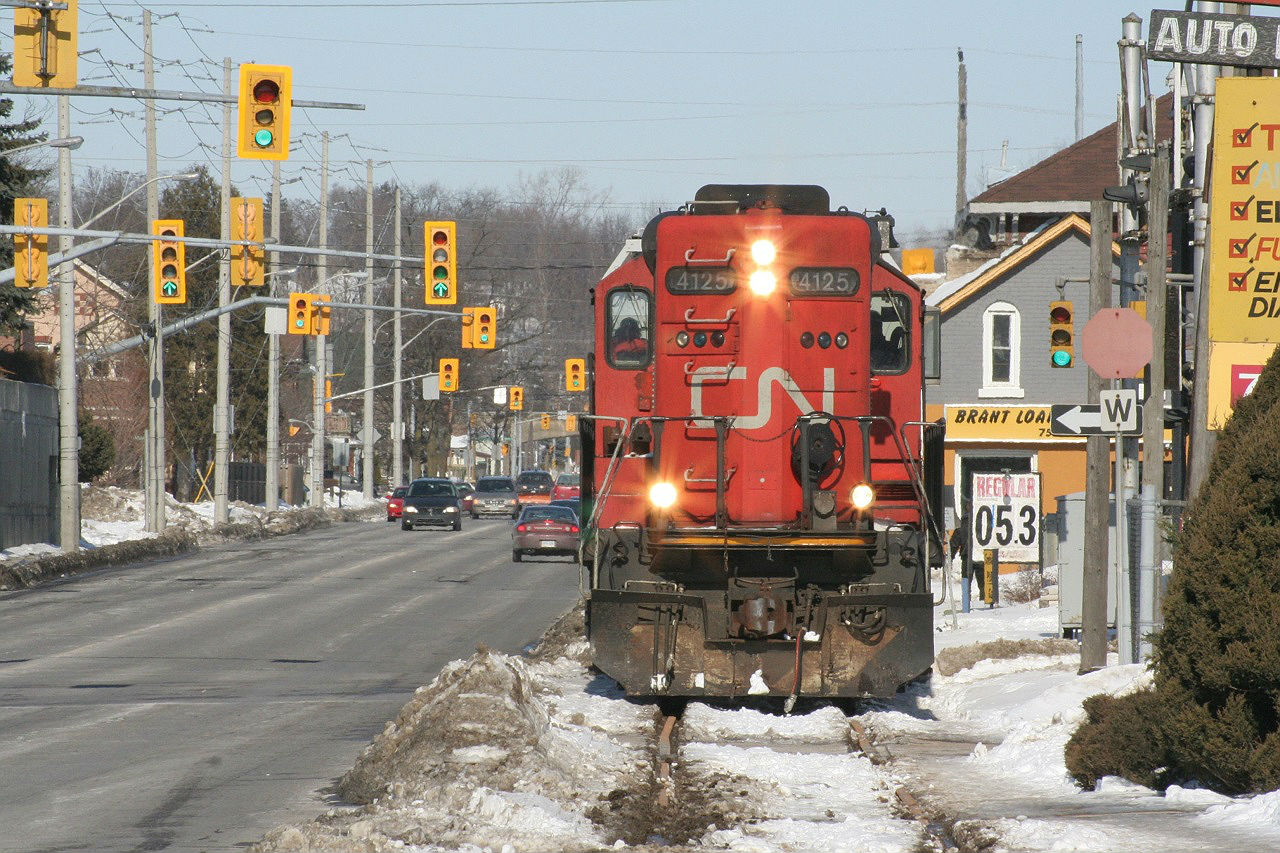 As a follow up to Steve's shot on January 13, here is a view about 8 years earlier at the same location. The main difference: CN power in the form a GP9 running long-hood forward.