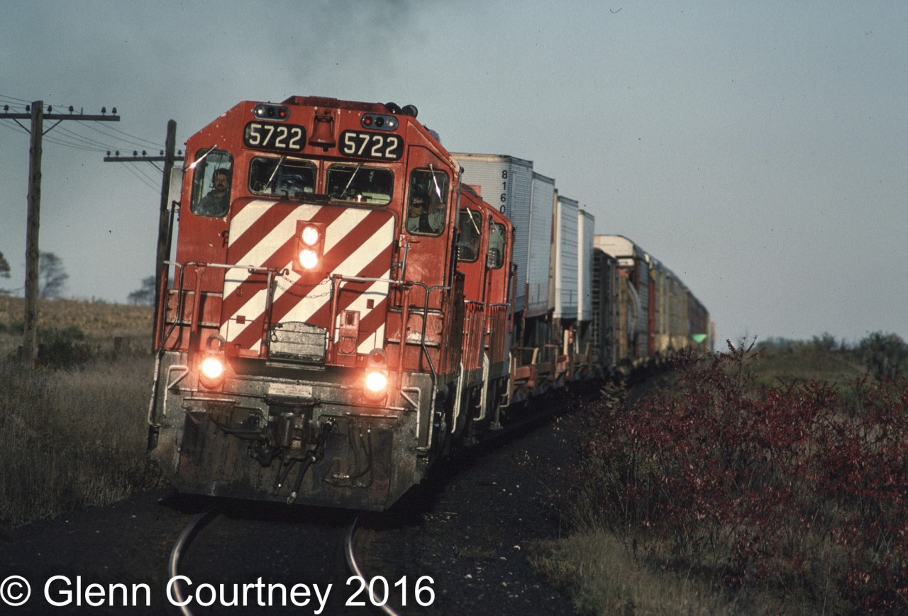CPR SD40-2 5722 West heads into the setting sun at Wolverton.